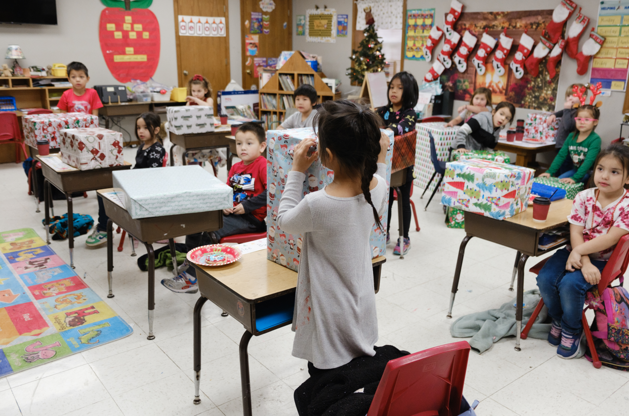 children opening christmas gifts