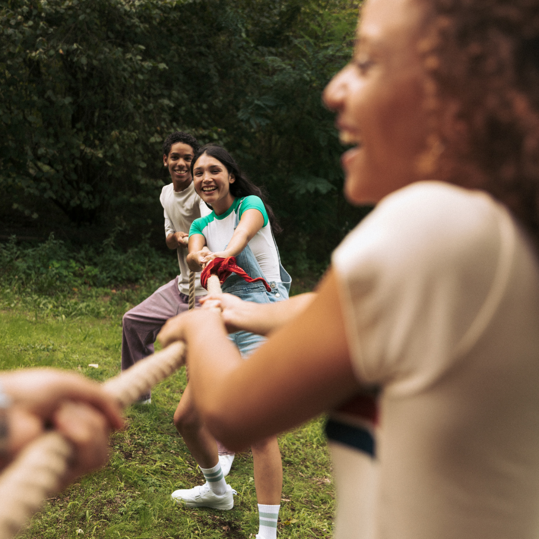 high school kids playing tug of war